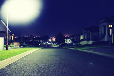 Illuminated street light at night