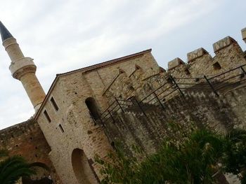 Low angle view of old building against sky