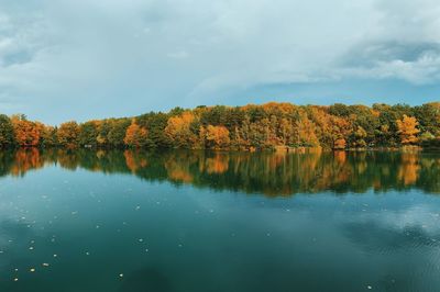 Scenic view of lake against sky during autumn