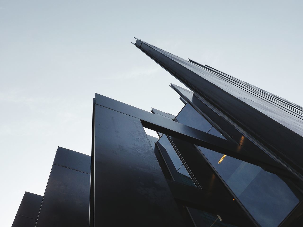 LOW ANGLE VIEW OF MODERN OFFICE BUILDING