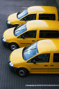 High angle view of yellow car on street