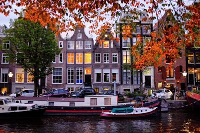 Boats moored in canal