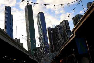 Low angle view of modern buildings against sky