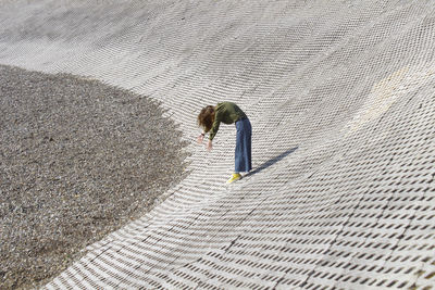 High angle view of umbrella on sand