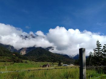 View of landscape against cloudy sky