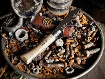 High angle view of old objects on table