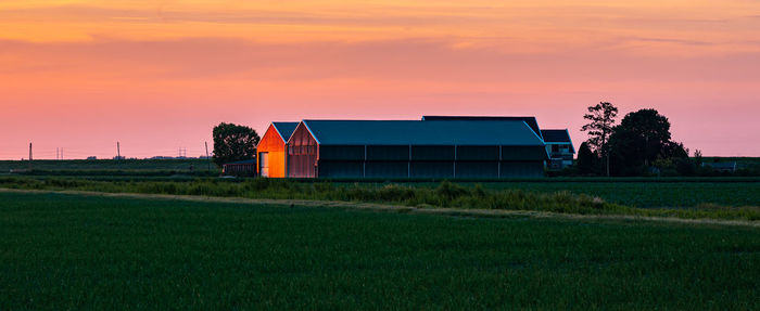 Panoramic view of a dutch farm in the evening light