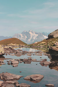 Scenic view of snowcapped mountains against sky