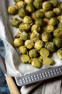 High angle view of brussels sprout in tray on table