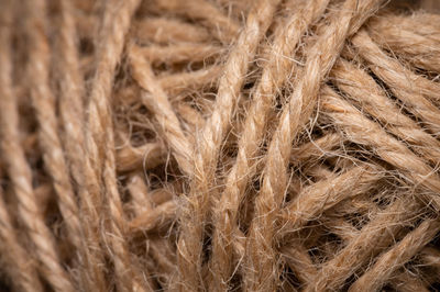 Natural jute twine, macro photography. jute thread texture. a coil of jute rope. close-up