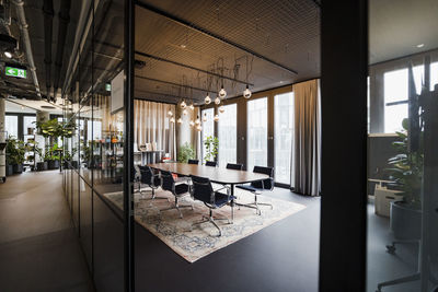 Illuminated conference room at coworking space