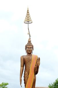 Low angle view of statue against sky