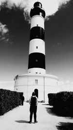 Full length of man standing on lighthouse against sky