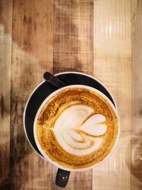 Directly above shot of cappuccino on table