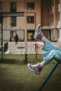Low section of man exercising in gym