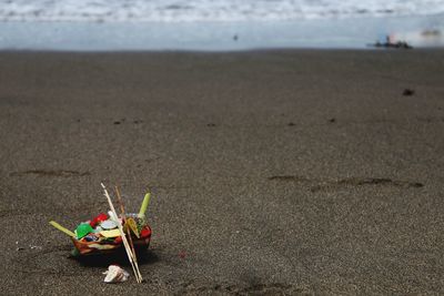 Close-up of toy on beach