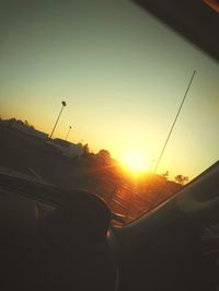 Sunset seen through car windshield