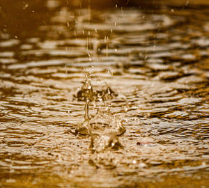 Close-up of water splashing in lake