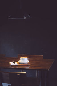 Coffee cup on table in cafe