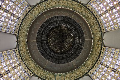 Directly below shot of ornate ceiling