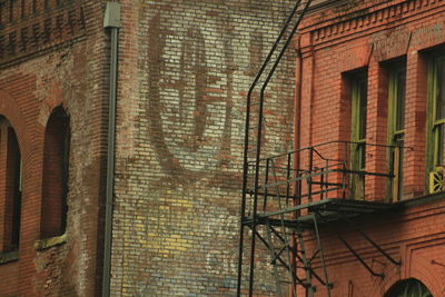 Low angle view of brick wall