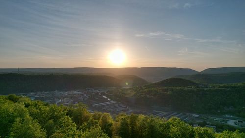Scenic view of landscape against sky during sunset