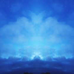 Low angle view of clouds in blue sky