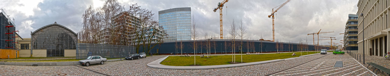 Panoramic view of city buildings against sky