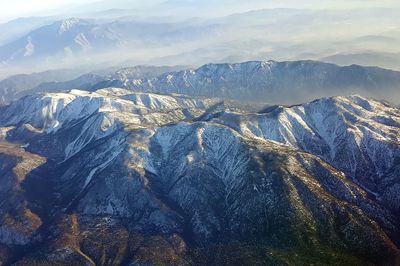 Aerial view of mountains against sky