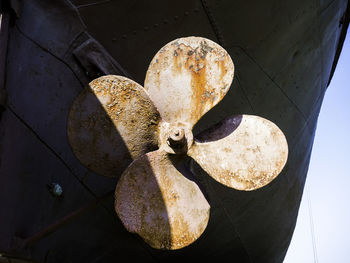 Low angle view of decoration hanging on metal