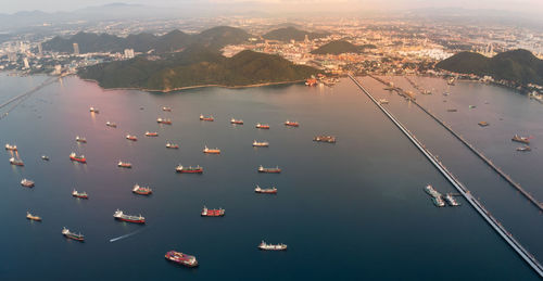 High angle view of boats in sea against sky