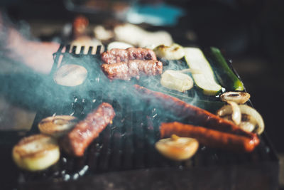 Close-up of meat on barbecue