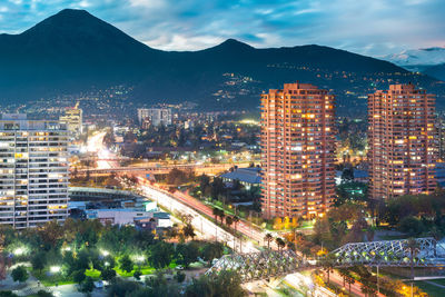 Las condes district in santiago de chile and manquehue avenue with manquehue hill in the back