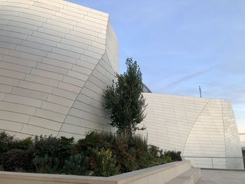 Low angle view of building against clear blue sky