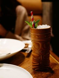 Close-up of drink served on table