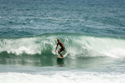 Man surfing in sea