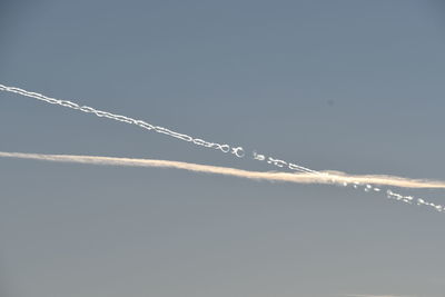 Low angle view of vapor trail in sky