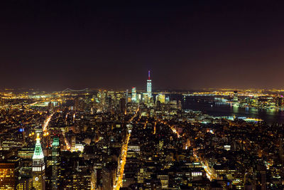 Manhattan illuminated skyscrapers buildings at night in new york city, usa.  