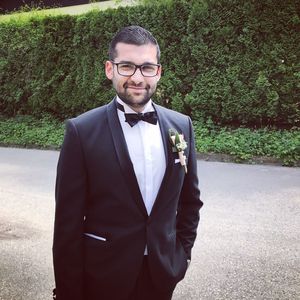 Portrait of young man standing outdoors