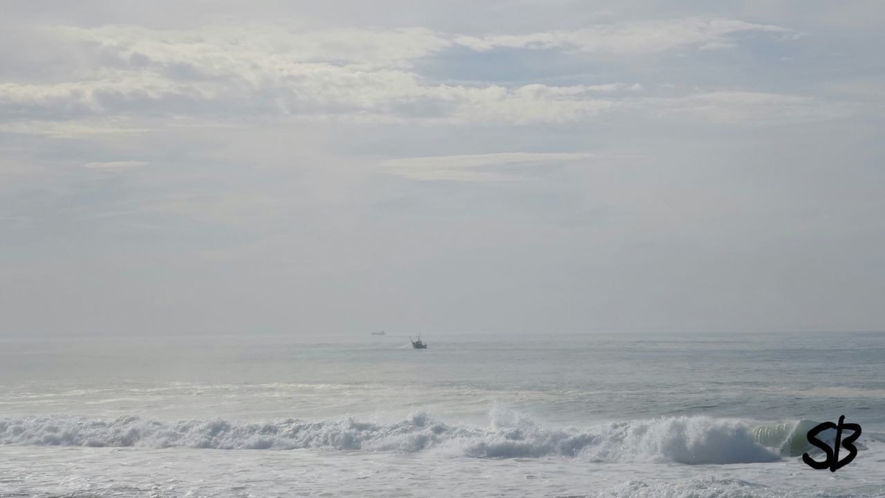 sea, water, horizon over water, wave, transportation, sky, scenics, mode of transport, beauty in nature, waterfront, nautical vessel, motion, nature, beach, surf, leisure activity, surfing, tranquil scene