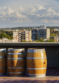 High angle view of glass of building against sky