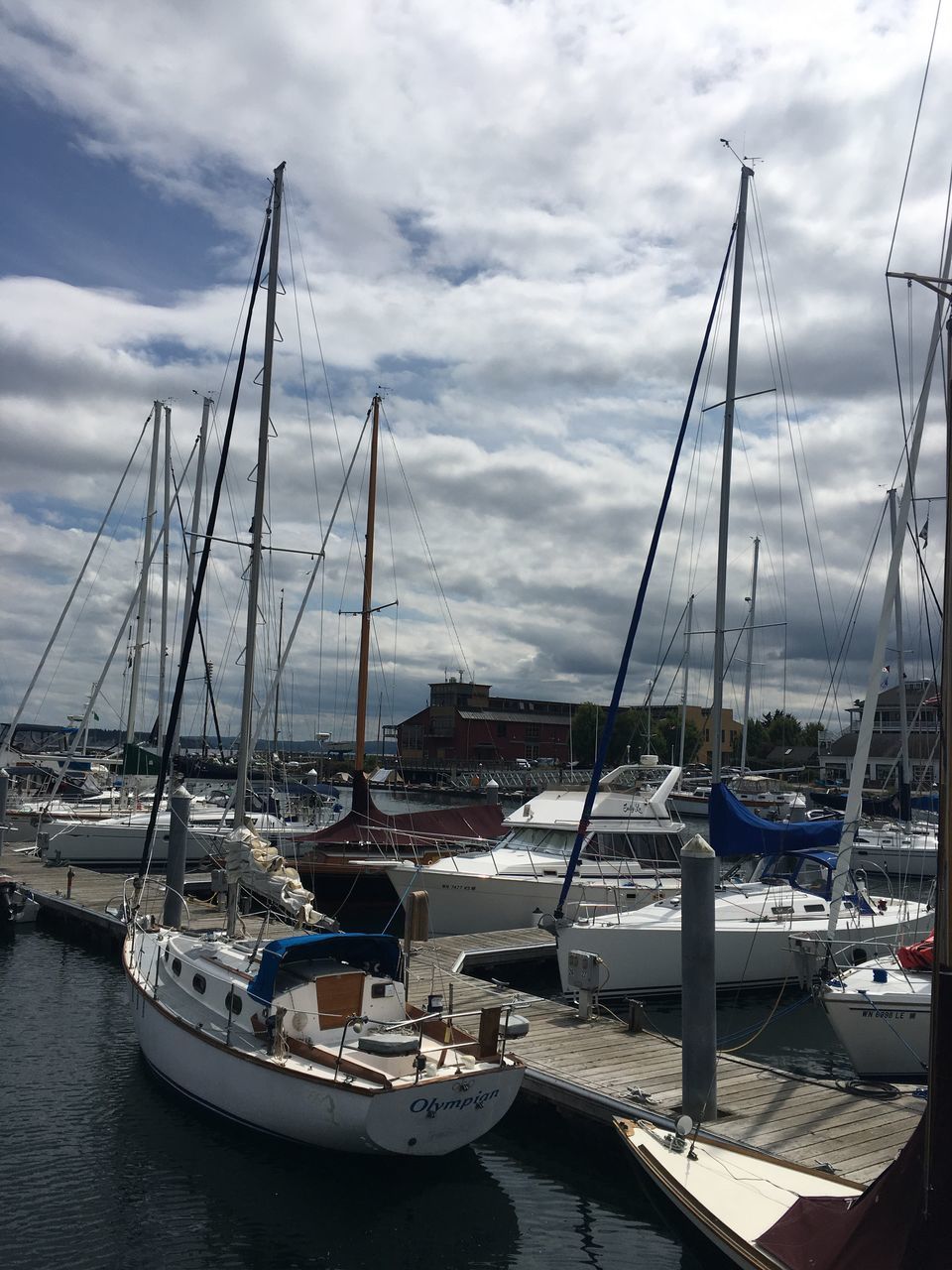 nautical vessel, cloud - sky, transportation, water, sailboat, mode of transportation, sky, moored, mast, pole, harbor, sea, nature, day, no people, architecture, outdoors, built structure, travel, yacht, marina, port