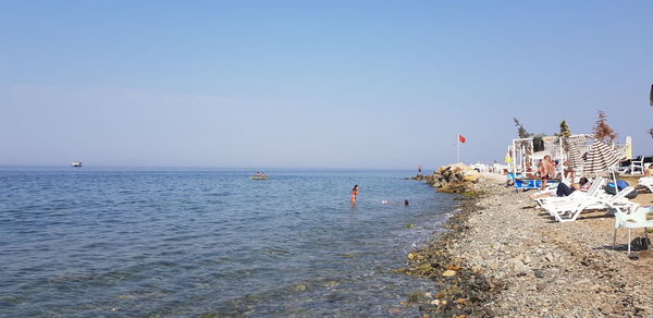 Panoramic view of sea against clear sky