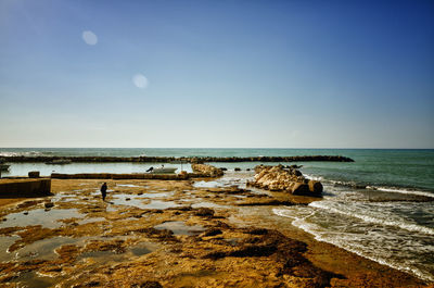 Scenic view of sea against clear sky