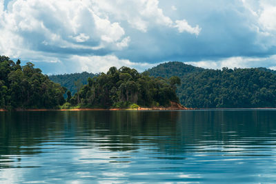 Kenyir lake small islands with beautiful rainforest tropical jungle. scenic landscape view.