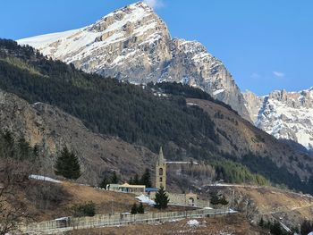 Scenic view of snowcapped mountains against sky