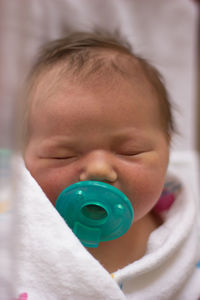 Close-up of girl holding camera