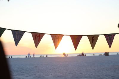 View of beach at sunset