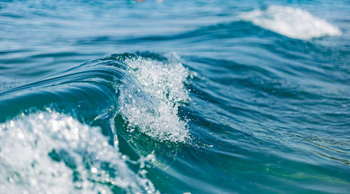 Close-up of water splashing in sea