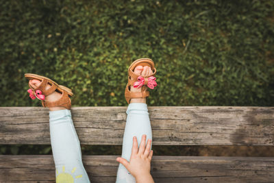 Close-up of girl sitting outdoors